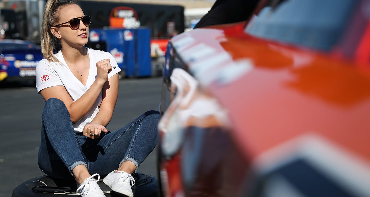 Brittney Zamora #99 talks with reporter Davey Segal at the NAPA/ENEOS 150 presented by the West Coast Stock Car Hall of Fame at Kern County Raceway Park in Bakersfield, Calif. on Oct. 26, 2019.