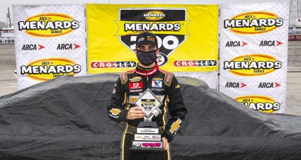 Sam Mayer, driver of the #21 Chevy Accessories Chevrolet, poses in Victory Lane after the Menards 200 presented by Crosley Brands for the ARCA Menards Series on August 2, 2020 at at Toledo Speedway in Toledo, Ohio. (Nic Antaya/ARCA Racing)