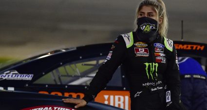 Hailie Deegan, driver of the #4 Monster Ford, leans against her car prior to the Zinsser SmartCoat 200 for the ARCA Menards Series at I-44 Speedway in Lebanon, Missouri on September 5, 2020. (Jeff Curry/ARCA Racing)