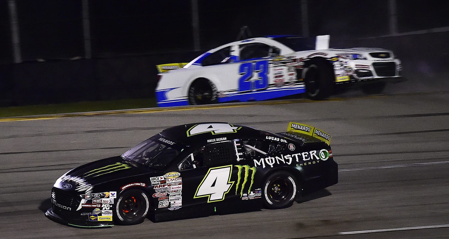 Hailie Deegan, driver of the #4 Monster Ford, drives past Bret Holmes, driver of the #23 Holmes II Excavation Chevrolet, after bumping him during the Zinsser SmartCoat 200 for the ARCA Menards Series at I-44 Speedway in Lebanon, Missouri on September 5, 2020. (Jeff Curry/ARCA Racing)