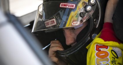 Derek Griffith, driver of the #22 Original Gourmet Lollipops Ford, adjusts his helmet during the practice of the Menards.com 200 presented by SPxE for the ARCA Menards series on July 31, 2020 at at Toledo Speedway in Toledo, Ohio. (Nic Antaya/ARCA Racing)