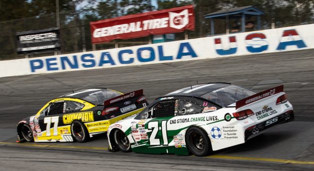 PENSACOLA, FL - Oct. 11: Sam Mayer, driver of the #21 End Stigma, Change Lives Chevrolet, racing Grant Enfinger, driver of the #77 Champion Power Equipment Ford during the Pensacola 200 Presented by Inspectra Thermal Solutions for the ARCA Menards Series East in Pensacola, Florida on Oct. 11, 2020. (Morgan Givens/ARCA Racing)