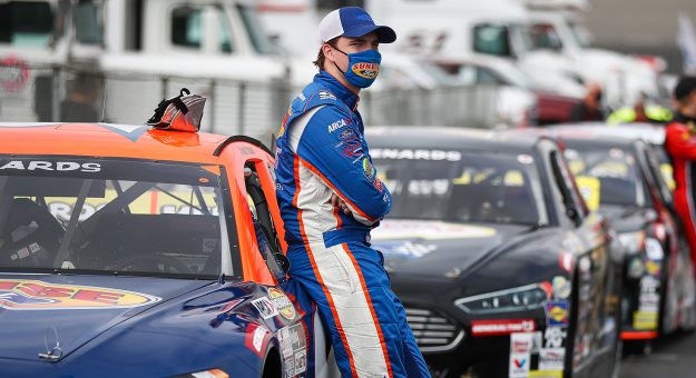 Blaine Perkins, driver of the No. 9 Sunrise Ford/Four Star Fruit Ford, stands with his car ahead of the NAPA ENEOS 125 at Kern County Raceway Park as part of the ARCA Menards Series West on Oct. 25, 2020 in Bakersfield, California. (Meg Oliphant/ARCA Racing)