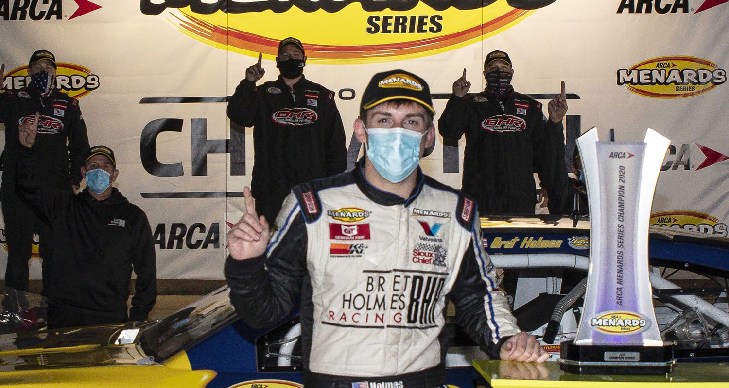 Bret Holmes, driver of the No. 23 Golden Eagle Syrup Chevrolet, celebrates winning the 2020 series championship after the Speediatrics 150 for the ARCA Menards Series at Kansas Speedway on Friday, Oct. 16, 2020. (Barry Cantrell/ARCA Racing)