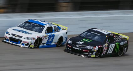 Bret Holmes, driver of the No. 23 Holmes II Excavation Chevrolet, and Riley Herbst, driver of the No. 18 Monster/Terrible Herbst/ORCA Toyota, race in the VizCom 200 for the ARCA Menards Series on Aug. 9, 2020 at Michigan International Speedway in Brooklyn, Michigan. (Allison Farrand/ARCA Racing)