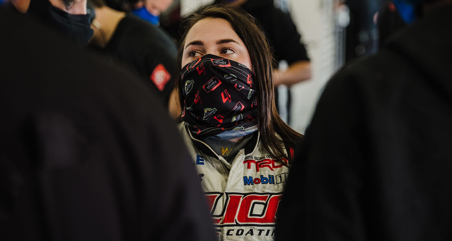 Gracie Trotter, driver of the No. 25 Venturini Motorsports Toyota, speaks with her crew after taking a test lap during the ARCA Menards Series test at Daytona International Speedway in Daytona Beach, Florida, on Jan. 15, 2021. (Kate Gardiner/ARCA Racing)