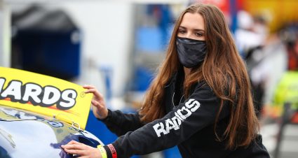 Bridget Burgess, driver of the No. 88 HMH Construction Toyota, pushes her car to the grid before the NAPA 125 for the ARCA Menards Series West at Kern County Raceway Park in Bakersfield, California, on Oct. 25, 2020. (Meg Oliphant/NASCAR)