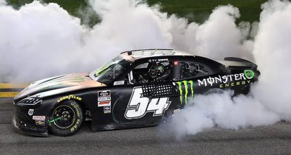 Ty Gibbs, driver of the No. 54 Monster Energy Toyota, celebrates winning the Super Start Batteries 188 for the NASCAR Xfinity Series at Daytona International Speedway in Daytona Beach, Florida, on Feb. 20, 2021. (James Gilbert/Getty Images)