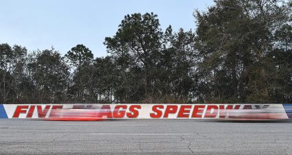 Cars speeding past the 5 Flags Speedway backstretch during the ARCA Pensacola 200 Presented by Inspectra Thermal Solutions for the ARCA Menards Series East in Pensacola, Florida on February 27, 2021. (Morgan Givens/ARCA Racing)