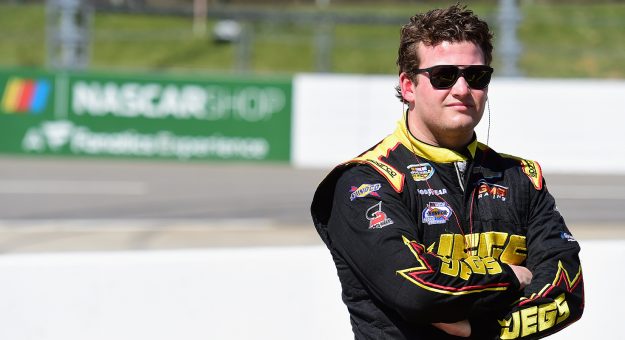 MARTINSVILLE, VA - MARCH 23:  Cody Coughlin, driver of the #2 JEG's.com Chevrolet, stands in the garage area during practice for the NASCAR Camping World Truck Series Alpha Energy Solutions 250 at Martinsville Speedway on March 23, 2018 in Martinsville, Virginia.  (Photo by Jared C. Tilton/Getty Images) | Getty Images