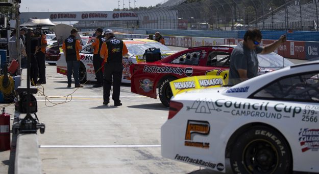 Crews work on their cars in pit lane before the Clean Harbors 100 at The Glen for the ARCA Menards Series at Watkins Glen International in Watkins Glen, New York on August 6, 2021. (Brett Carlsen/ARCA Racing)