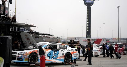 Crew members for Daniel Dye, driver of the #43 Race To Stop Suicide Chevrolet, work on his car prior to practice for the Kansas 150 for the ARCA Menards Series at Kansas Speedway in Kansas City, Kansas on September 10, 2022. (Ed Zurga/ARCA Racing)