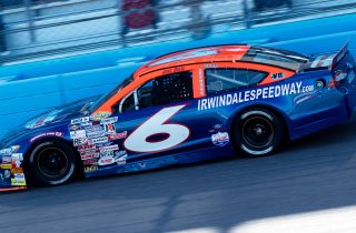 Jake Drew, driver of the #6 Sunrise Racing, Molecule,Group A Ford running is 6th place during the Desert Diamond Casino West Valley 100 for the ARCA Menards Series West at Phoenix Raceway in Avondale, Arizona, on November 4, 2022. (Zac BonDurant/ARCA Racing)