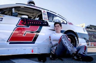 Nick Sanchez, driver of the #2 Max Siegel Inc Chevrolet, looks on before the Henry Ford Health 200 for the ARCA Menards Series at Michigan International Speedway on August 6, 2022 in Brooklyn, Michigan. (Nic Antaya/ARCA Racing)