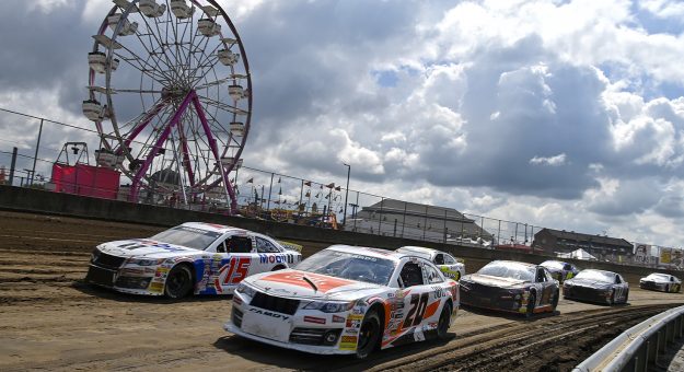 Jesse Love, driver of the #20 JBL Toyota, and Buddy Kofoid, driver of the #15 Mobil 1 Toyota, lead the pack during the Atlas 100 for the ARCA Menards Series at the Illinois State Fairgrounds in Springfield, Illinois on August 21, 2022. (Jeff Curry/ARCA Racing)