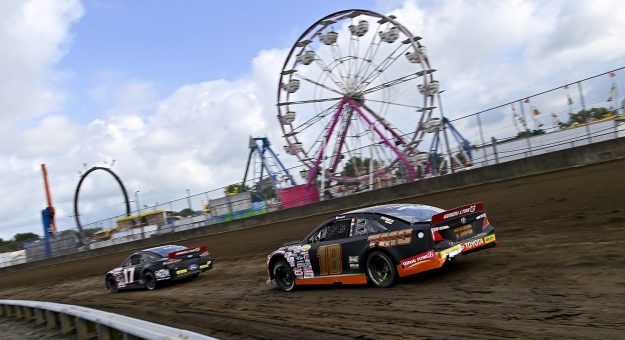 Taylor Gray, driver of the #17 Ford Performance-Mission 22 Ford, drives against Sammy Smith, driver of the #18 TMC Toyota, during the Atlas 100 for the ARCA Menards Series at the Illinois State Fairgrounds in Springfield, Illinois on August 21, 2022. (Jeff Curry/ARCA Racing)