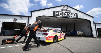 Members of the #43 Champion Container Chevrolet, team push the car to inspections prior to the General Tire Delivers 200 for the ARCA Menards Series at Pocono Raceway in Long Pond, Pennsylvania on July 22, 2022. (Mike Lawrence/ARCA Racing)