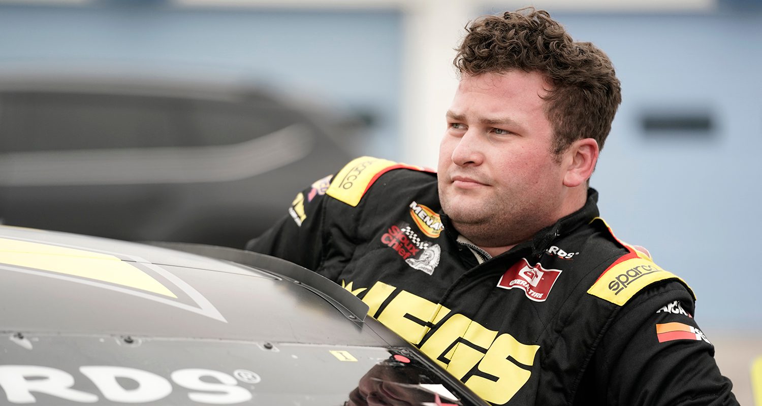 Cody Coughlin, driver of the #72 JEGS-Coughlin Company Ford, gets out of his car after qualifying for the Kansas 150 for the ARCA Menards Series at Kansas Speedway in Kansas City, Kansas on September 10, 2022. (Ed Zurga/ARCA Racing)