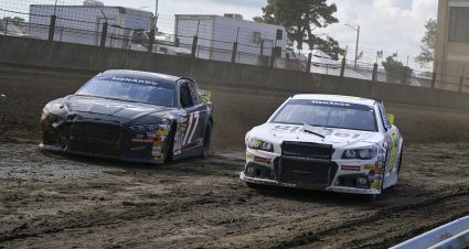 Taylor Gray, driver of the #17 Ford Performance-Mission 22 Ford, and Nick Sanchez, driver of the #2 Gainbridge-Max Siegel Inc Chevrolet, drive during the Atlas 100 for the ARCA Menards Series at the Illinois State Fairgrounds in Springfield, Illinois on August 21, 2022. (Jeff Curry/ARCA Racing)