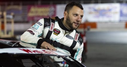 Justin Bonsignore, driver of the #51 Phoenix Communications Inc. Modified climbs into his car during the Eddie Partridge 256 for the Whelen Modified Tour at Riverhead Raceway on September 16, 2023 in Riverhead, New York. (Kostas Lymperopoulos/NASCAR)