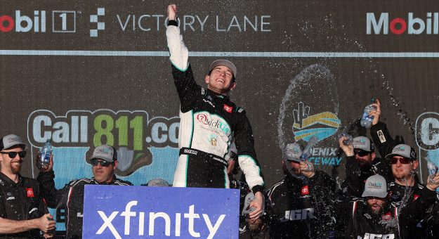 AVONDALE, ARIZONA - MARCH 09: Chandler Smith, driver of the #81 QuickTie Toyota, celebrates in victory lane after winning the NASCAR Xfinity Series Call 811.com Every Dig. Every Time. 200 at Phoenix Raceway on March 09, 2024 in Avondale, Arizona. (Photo by Meg Oliphant/Getty Images) | Getty Images