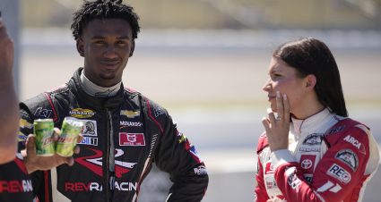 Amber Balcaen, driver of the #22 Icon Toyota talks with Lavar Scott, driver of the #6 Max Siegel Inc Chevrolet after qualifying for the Atlas 150 for the ARCA Menards Series and the ARCA Menards Series East at Iowa Speedway in Newton, Iowa on June 14, 2024. (Matthew Putney/ARCA Racing)