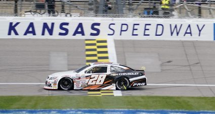 Connor Mosack, driver of the #28 Chevrolet Performance Chevrolet, takes the checkered flag to win the Tide 150 for the ARCA Menards Series at Kansas Speedway on May 4, 2024 in Kansas City, Kansas. (Ed Zurga/ARCA Racing)