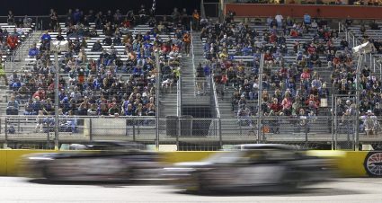 Fans watch as cars race by during the Star Nursery 150 for the ARCA Menards Series West at the Bullring at Las Vegas Motor Speedway in Las Vegas, Nevada on October 13, 2023. (Ian Maule/ARCA Racing)