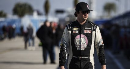 Trevor Huddleston walks in the garage area during ARCA Practice on January 9th, 2025 at Daytona International Speedway in Daytona Beach, Florida. Photo by James Gilbert