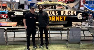 Brenden Queen and Lavar Scott take a tour of the Motorsports Hall of Fame of America