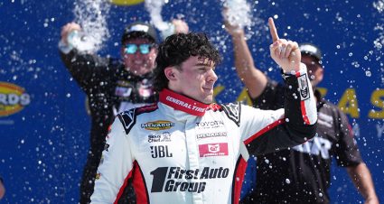 Gio Ruggiero, driver of the #18 First Auto Group Toyota, celebrates after winning the the Tide 150 for the ARCA Menards Series at Kansas Speedway on April 18, 2026 in Kansas City, Kansas. (Ed Zurga/ARCA Racing)