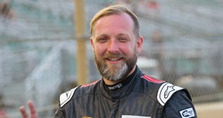 Promo image for Motorsports Hall of Fame of America displays Josh White’s United States Marine Corps dress uniform