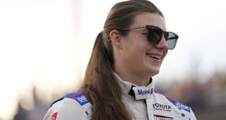 Isabella Robusto, driver of the #55 Mobil 1 Toyota, smiles before the Atlas 200 for the ARCA Menards Series at Madison International Speedway in Oregon, Wisconsin on August 28, 2026. (Aaron Gash/NASCAR)